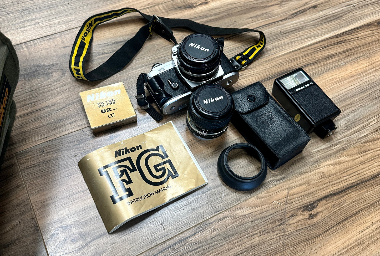 Nikon FG S# 8626169 with Nikon Lens Series E 50mm S# 2499378 and Nikon Lens Series E 100mm S# 1981050
