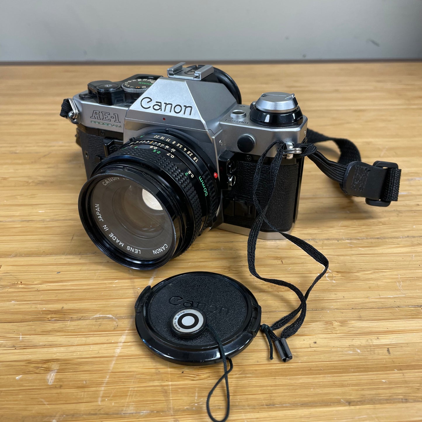 Canon AE-1 Program 35mm Camera Body S# 1987571 with Canon FD 50mm T1.8 Lens S# 4594729