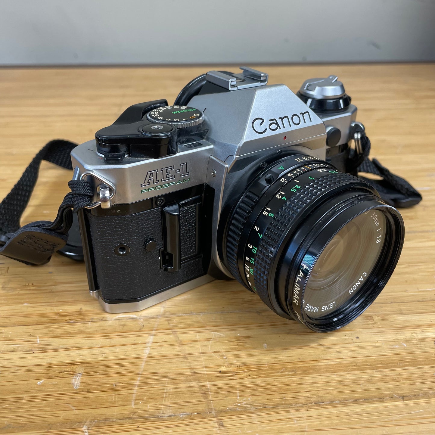 Canon AE-1 Program 35mm Camera Body S# 1987571 with Canon FD 50mm T1.8 Lens S# 4594729
