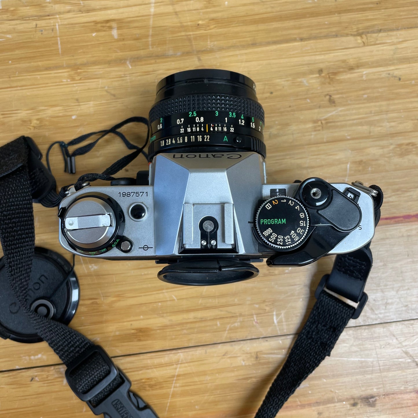 Canon AE-1 Program 35mm Camera Body S# 1987571 with Canon FD 50mm T1.8 Lens S# 4594729