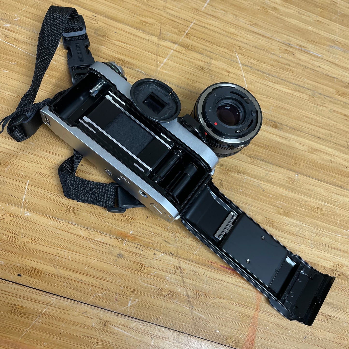 Canon AE-1 Program 35mm Camera Body S# 1987571 with Canon FD 50mm T1.8 Lens S# 4594729