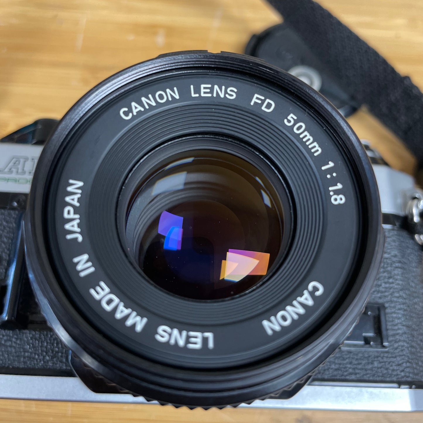 Canon AE-1 Program 35mm Camera Body S# 1987571 with Canon FD 50mm T1.8 Lens S# 4594729