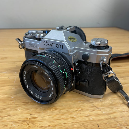 Canon AE-1 35mm Camera Body S# 5172458 with Canon FD 50mm T1.8 Lens S# 4155582