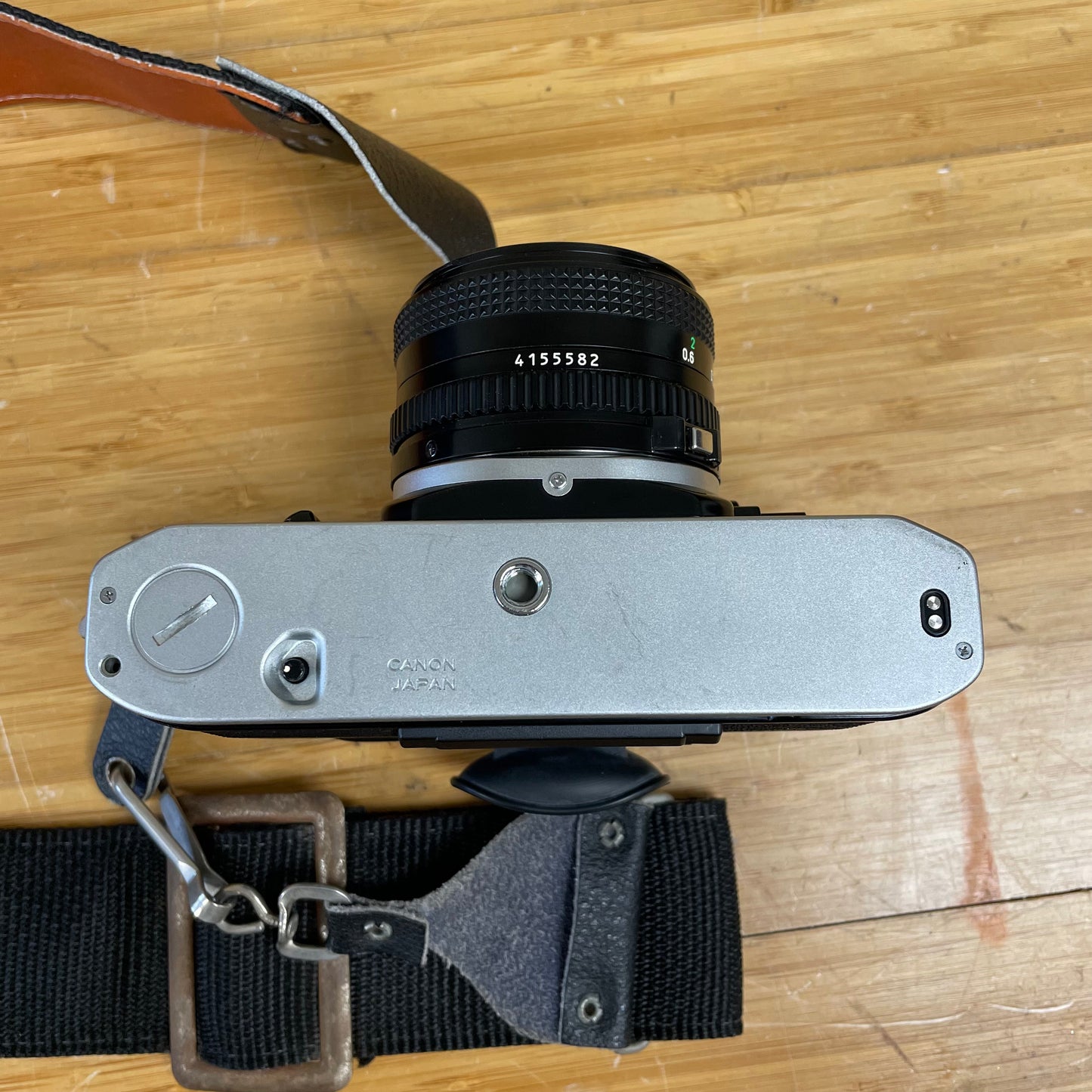 Canon AE-1 35mm Camera Body S# 5172458 with Canon FD 50mm T1.8 Lens S# 4155582
