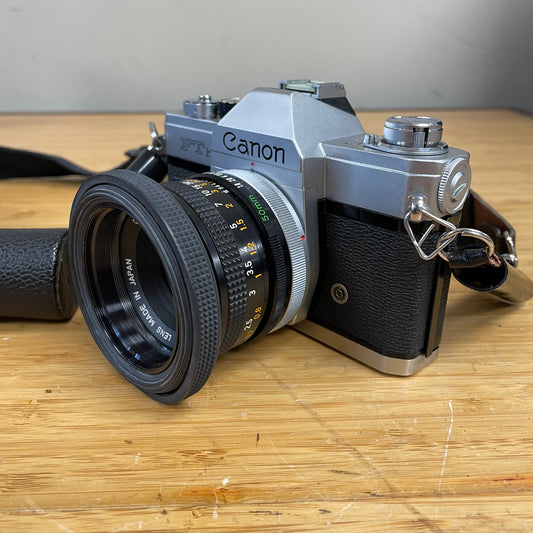 Canon FTb QL 35mm Camera Body S# 316608 w/ Canon FD 50mm T1.8 Lens S# 106768 & Canon Leather Case