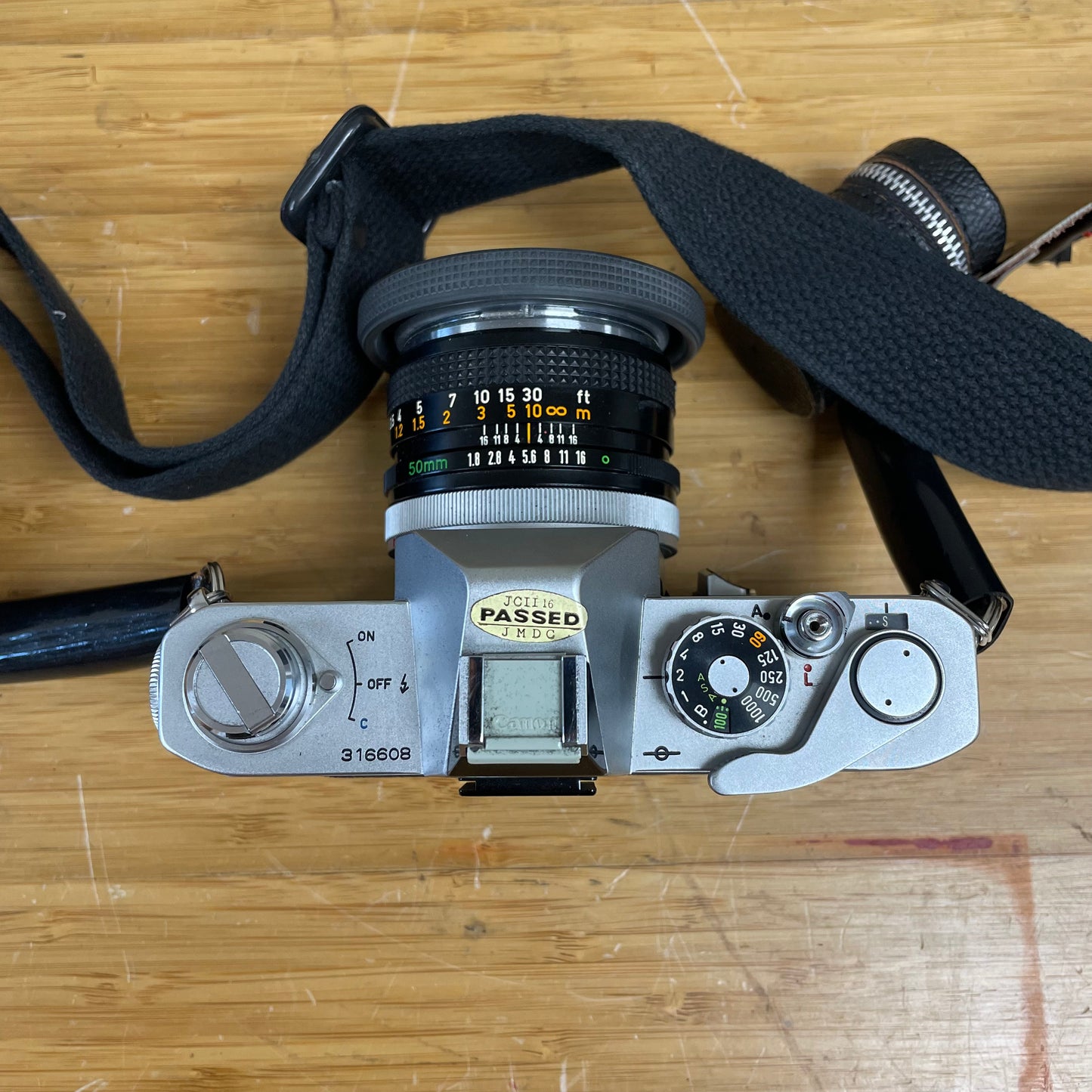 Canon FTb QL 35mm Camera Body S# 316608 w/ Canon FD 50mm T1.8 Lens S# 106768 & Canon Leather Case