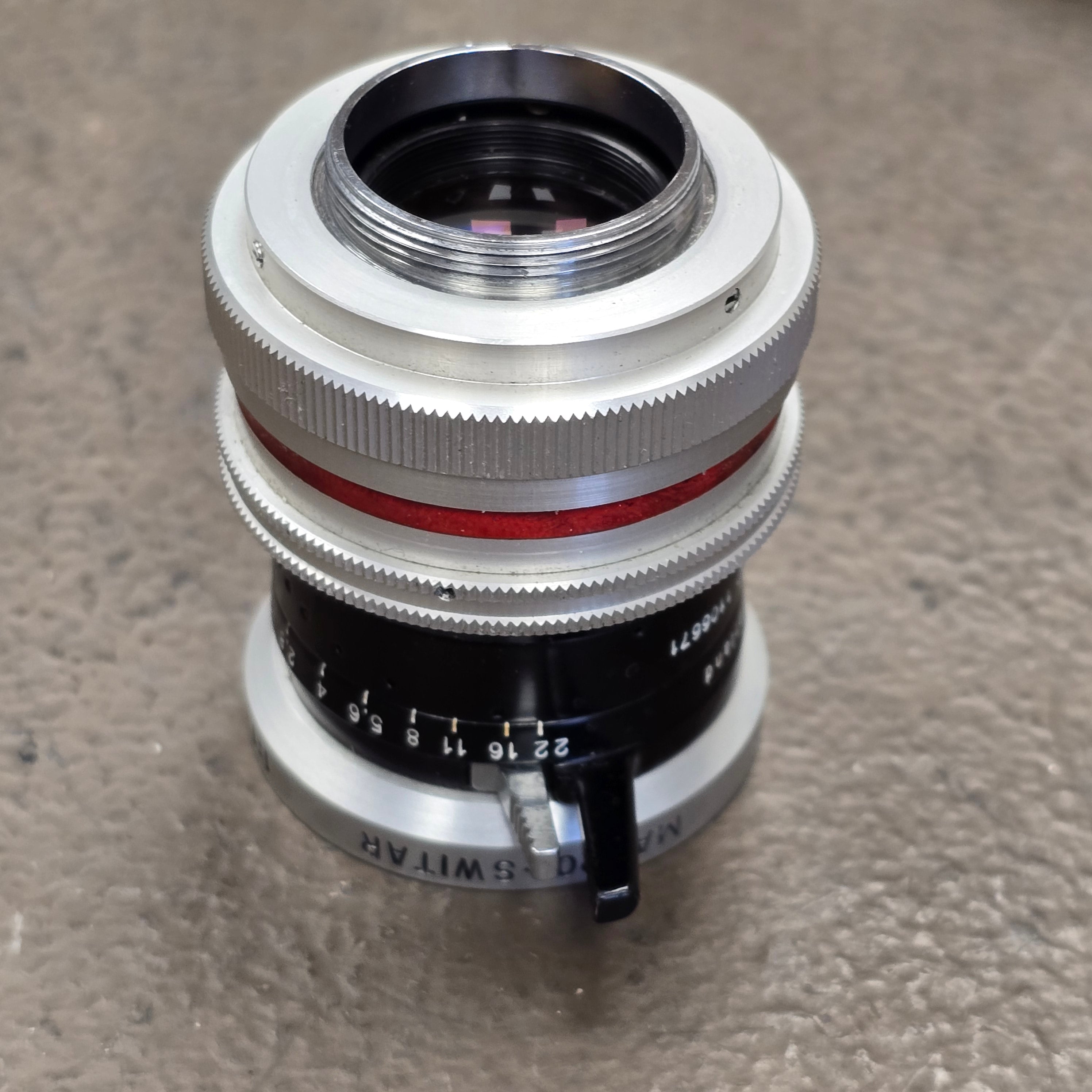 Switar 26mm Macro Preset f/1.1 H16 RX C-Mount Lens S# 1106671 – Du