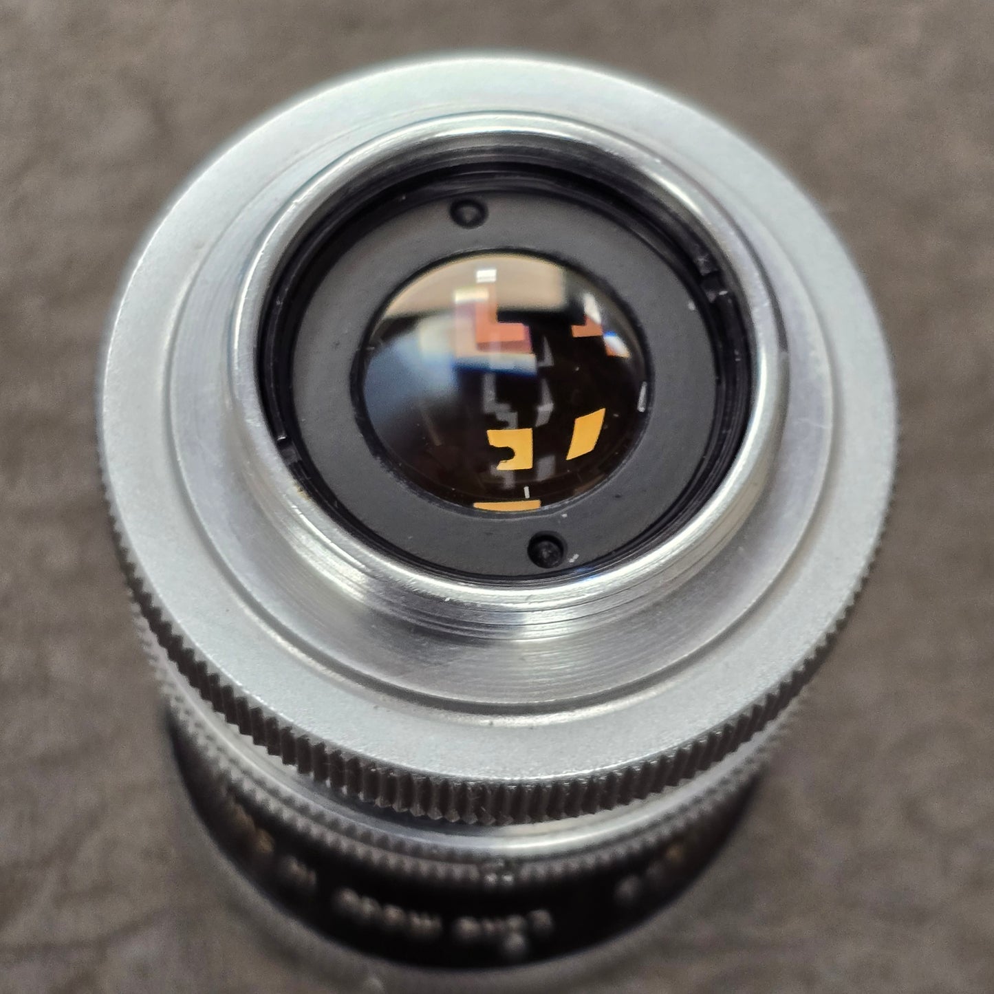 Switar 10mm f1.6 C-Mount Lens S# 1037028 with Bolex Series 6 Lens Shade