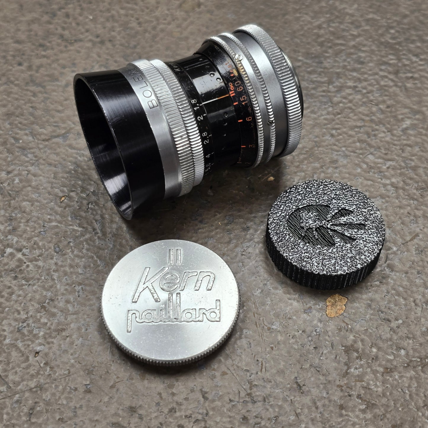 Switar 25mm f1.4 H16RX C-Mount Lens S# 934357 W/ Series 5 Lens Shade