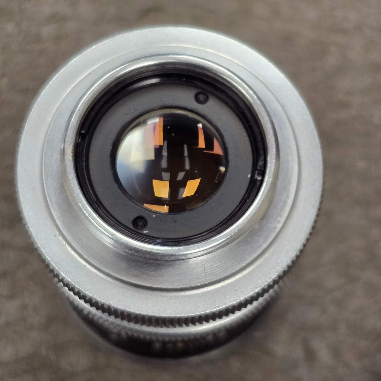 Switar 10mm f1.6 C-Mount Lens S# 1037028 with Bolex Series 6 Lens Shade