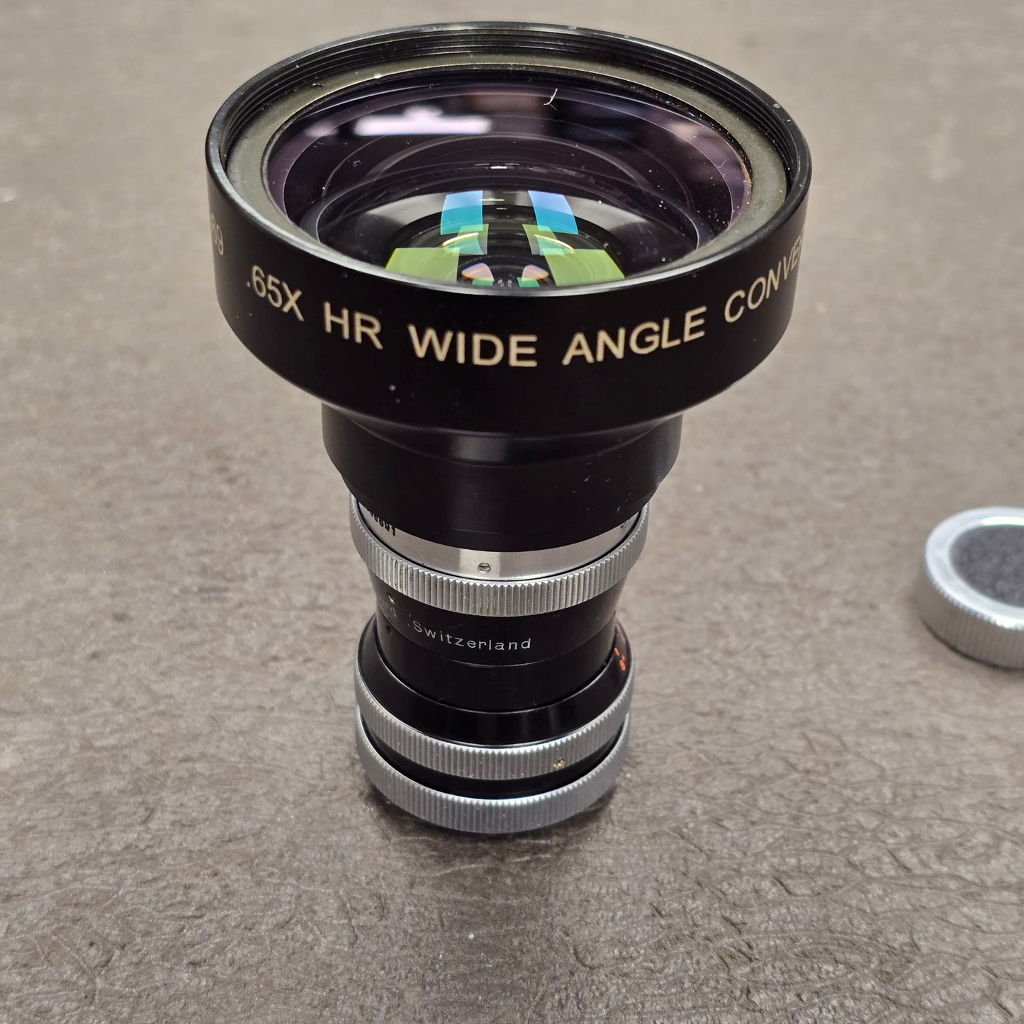 Switar 10mm f1.6 AR C-Mount Lens S# 508691 with Century Optics .65x HR Wide Angle Converter S# C93069