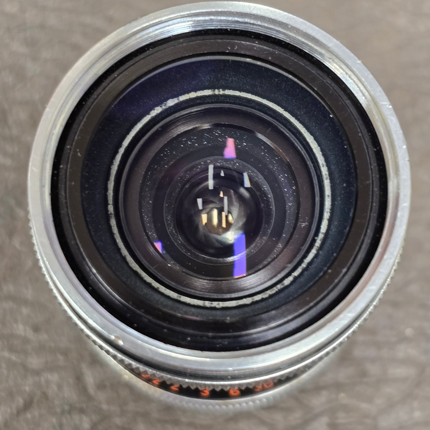 Switar 10mm f1.6 C-Mount Lens S# 1037028 with Bolex Series 6 Lens Shade