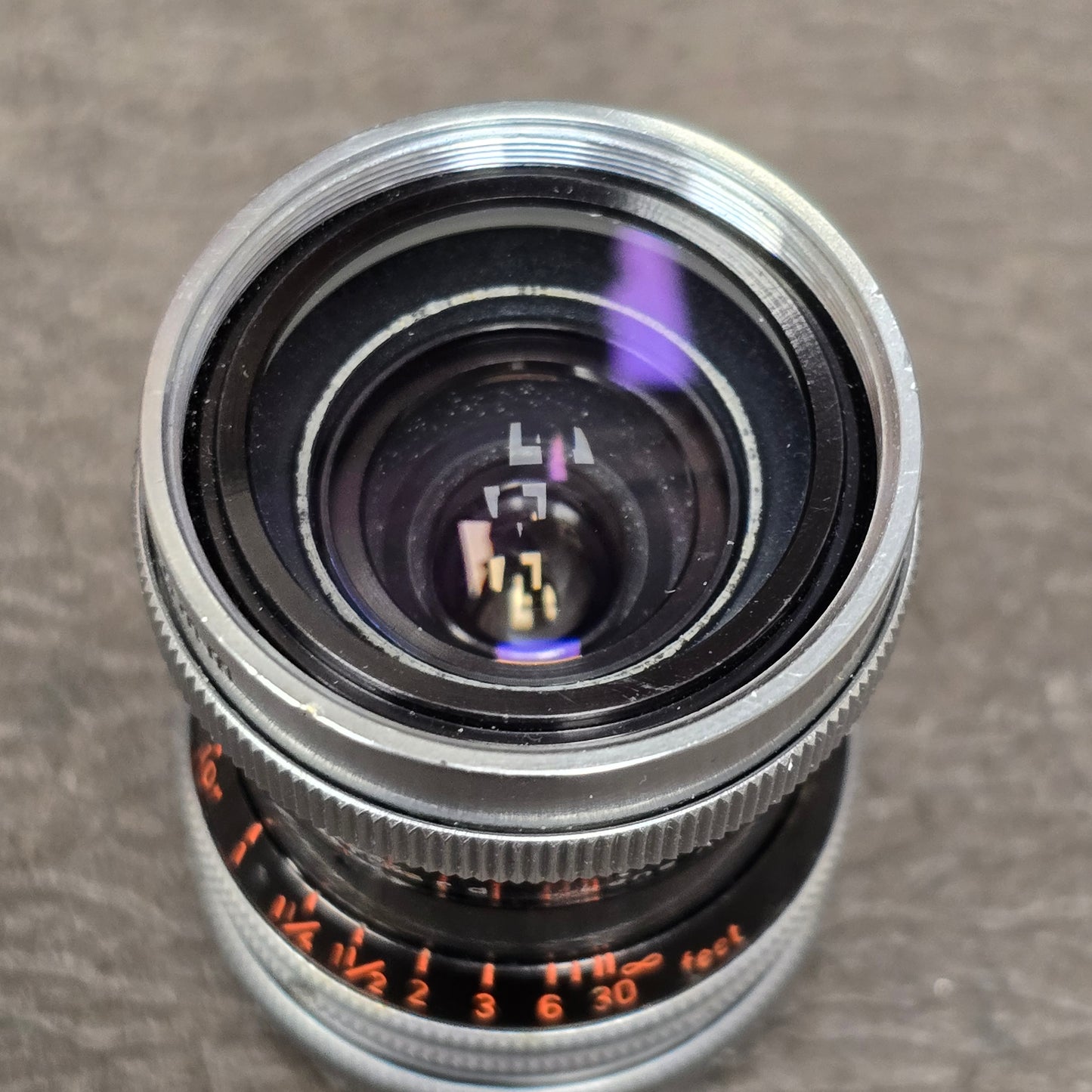 Switar 10mm f1.6 C-Mount Lens S# 1037028 with Bolex Series 6 Lens Shade