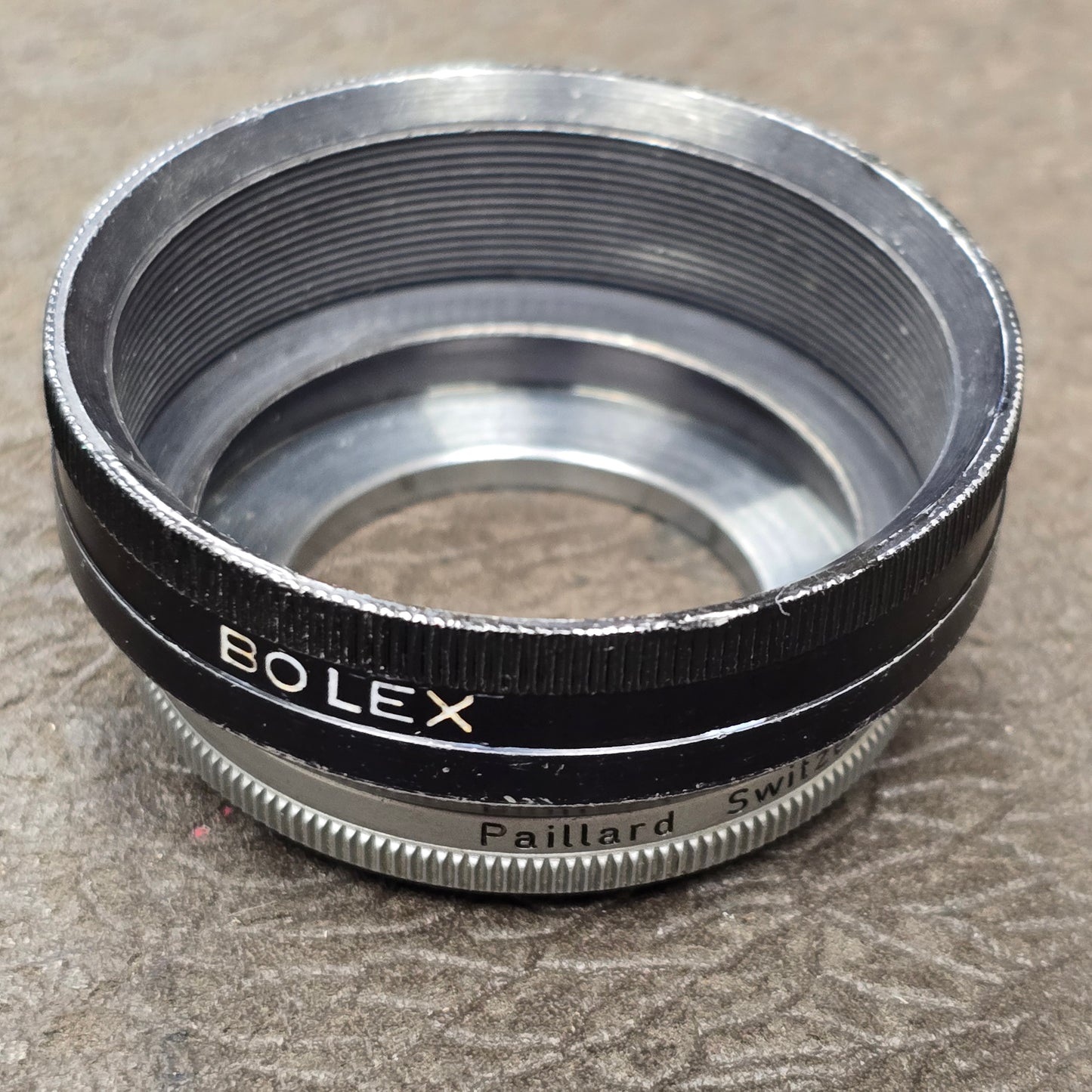 Switar 10mm f1.6 C-Mount Lens S# 1037028 with Bolex Series 6 Lens Shade