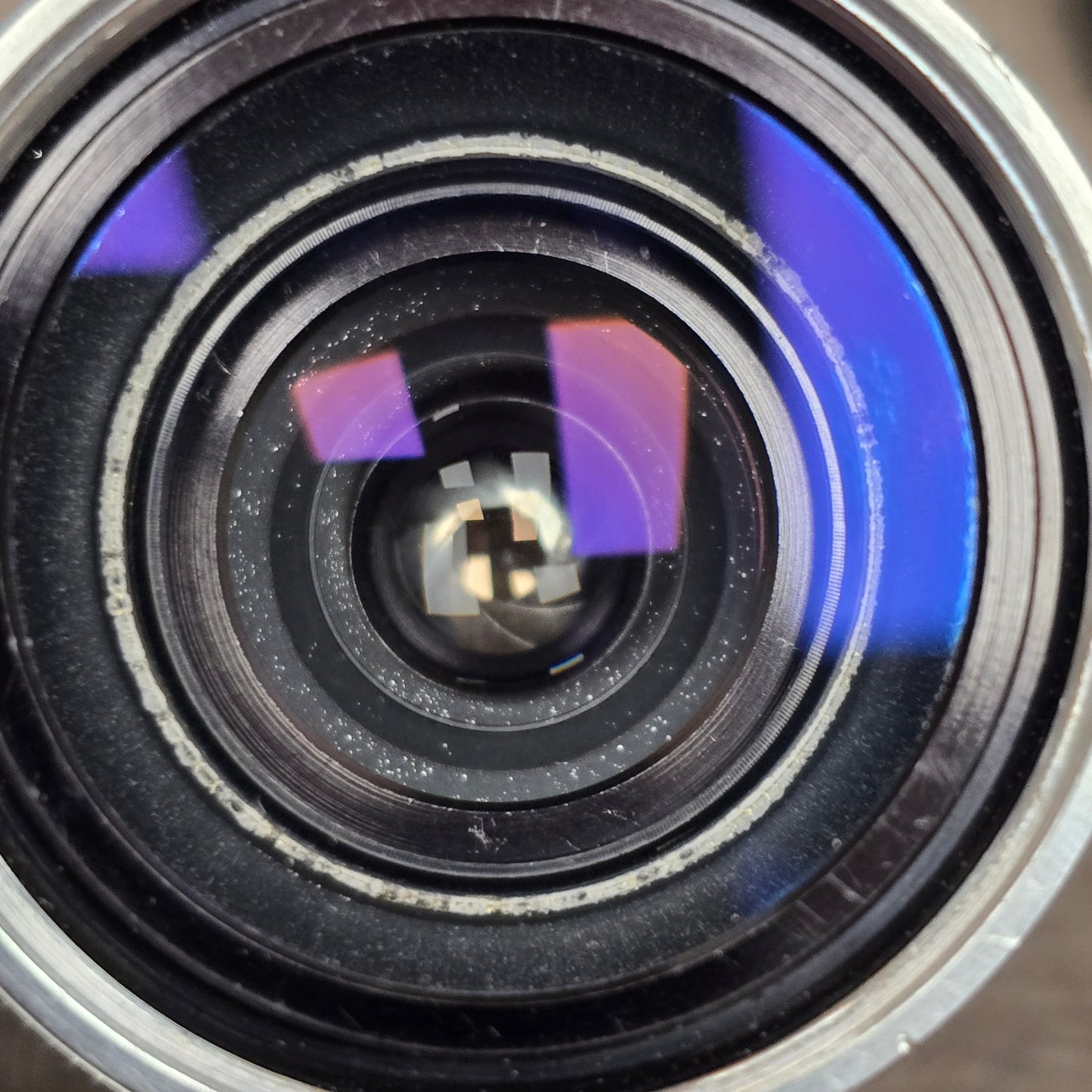 Switar 10mm f1.6 C-Mount Lens S# 1037028 with Bolex Series 6 Lens Shade
