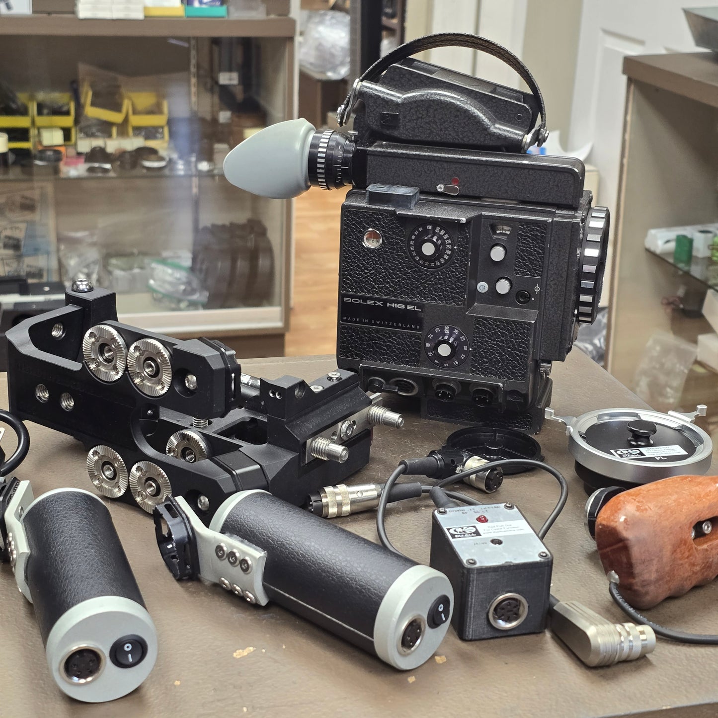 Bolex EL Super 16mm Camera Package with Tested Super 8 Custom Cage & Grip Batteries S# 310894